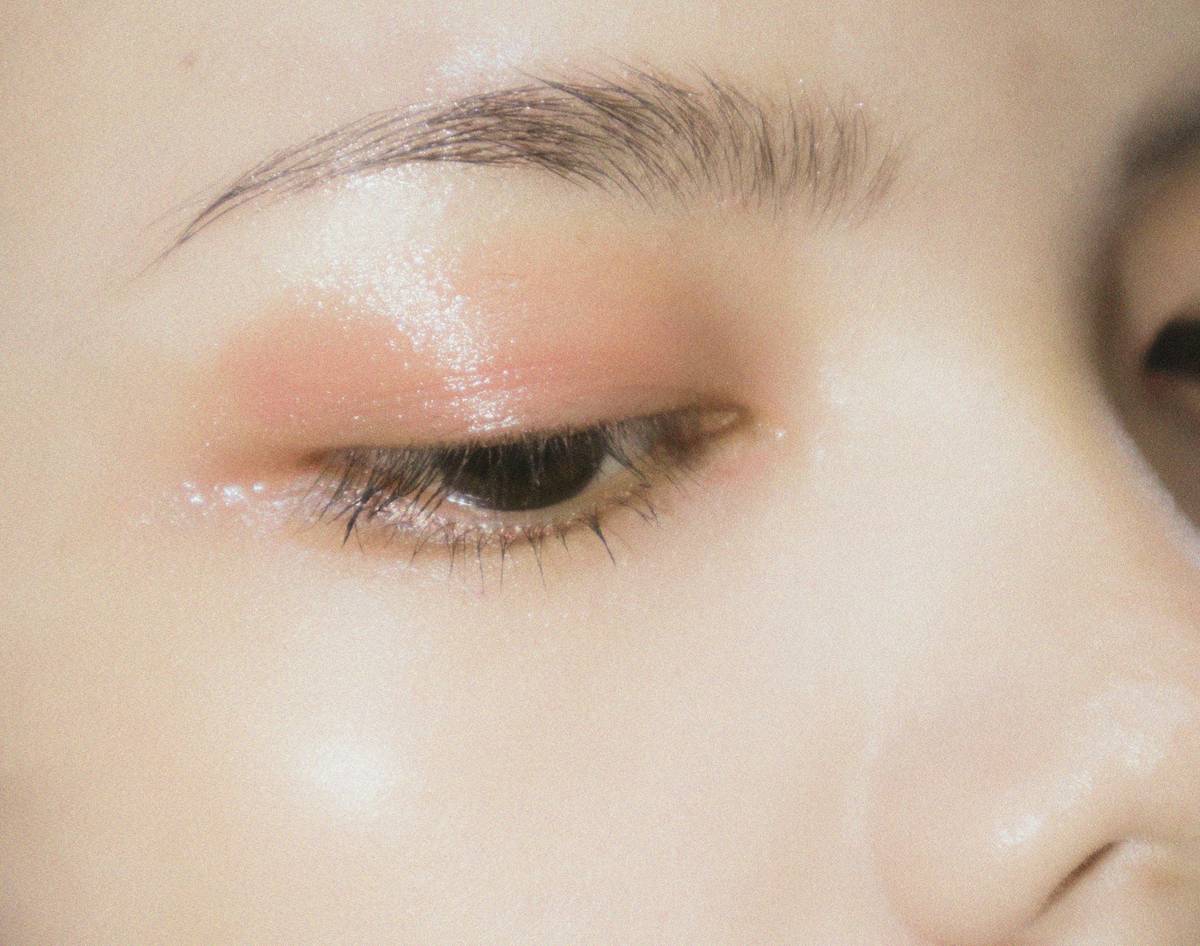 close-up of edgy makeup styles featuring textured lip and minimalist face structure highlighting
